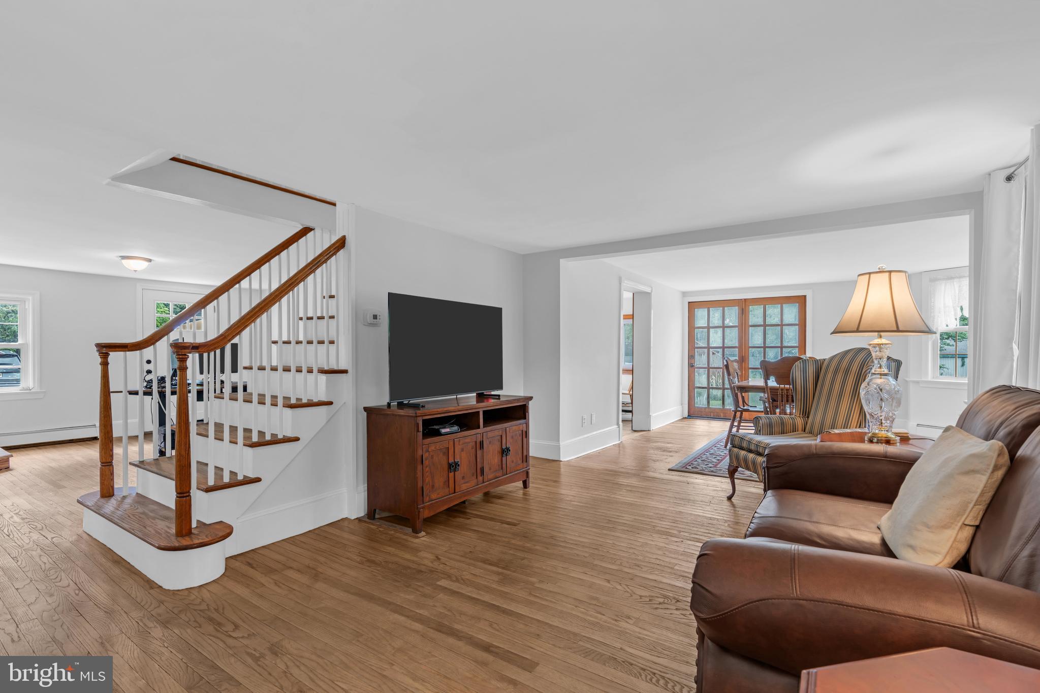 14 Maxim Road Howell, NJ 07731 - Photo 22 of 55 a living room with furniture and a flat screen tv