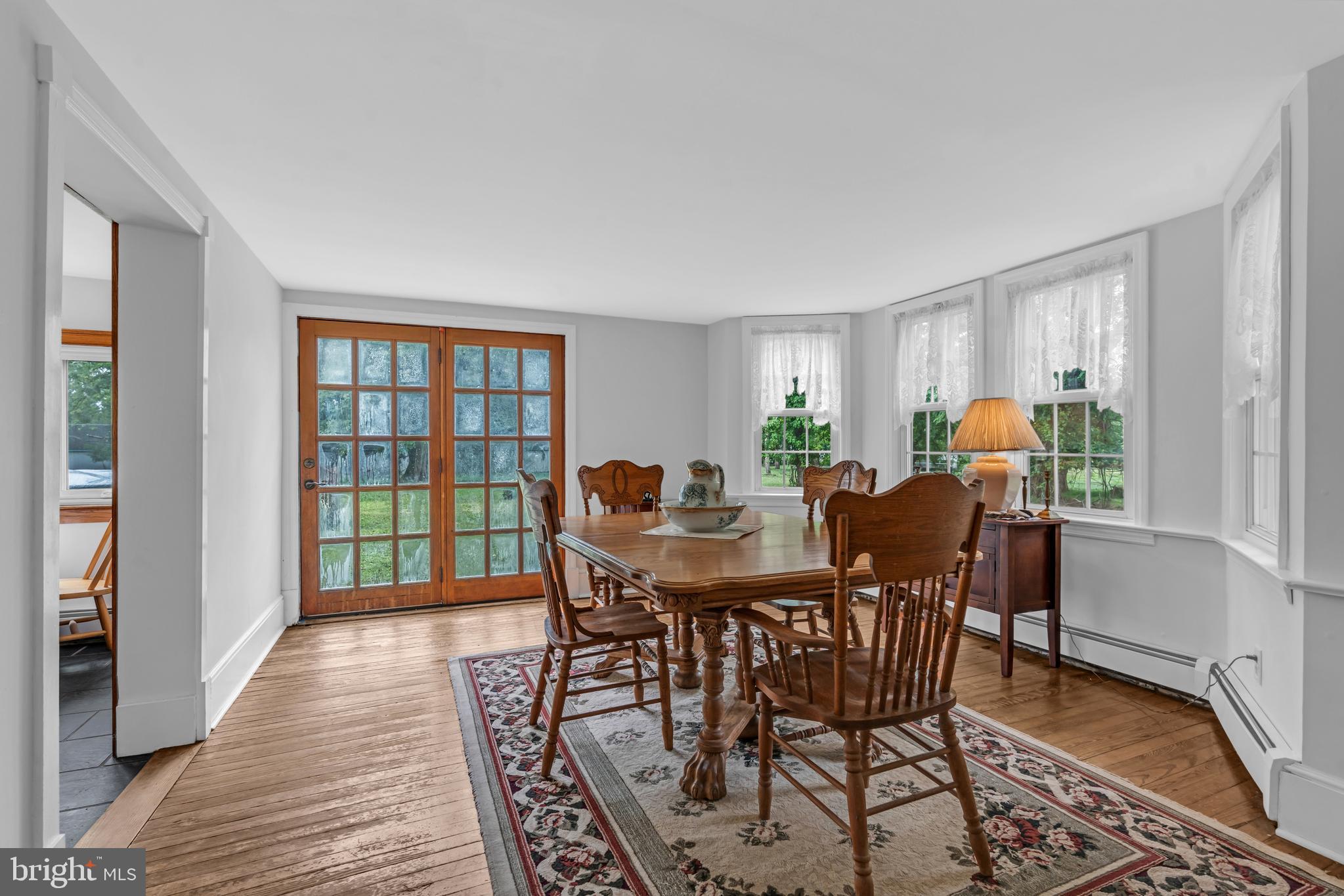 14 Maxim Road Howell, NJ 07731 - Photo 24 of 55 a view of a dining room with furniture window and wooden floor