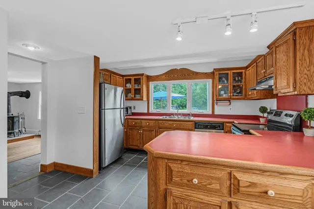 a view of a bedroom with furniture and staircase