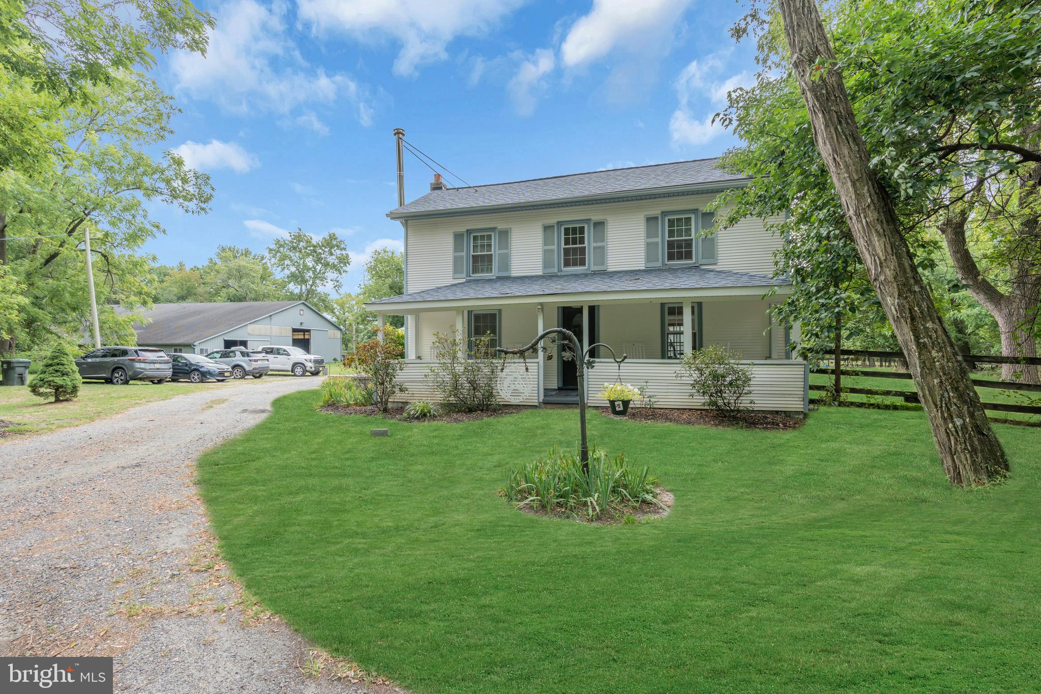 14 Maxim Road Howell, NJ 07731 - Photo 4 of 55 a view of a house with a back yard