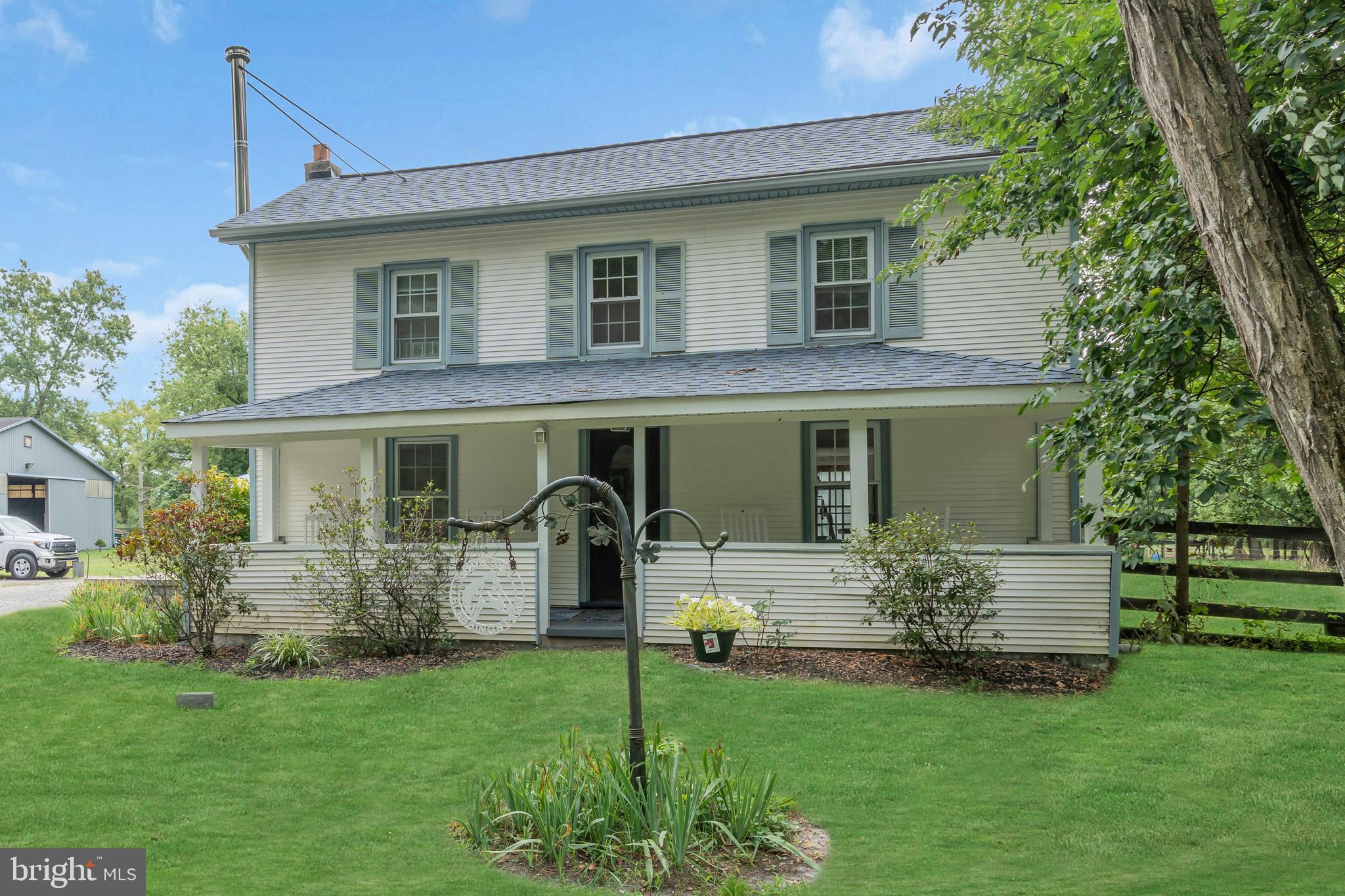 14 Maxim Road Howell, NJ 07731 - Photo 5 of 55 a front view of a house with a yard