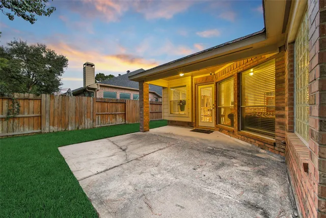 a view of backyard with green space