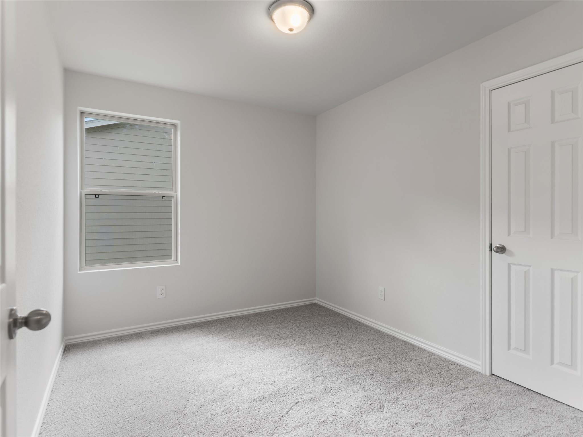 306 North Orange Street Sweeny, TX 77480 - Photo 15 of 30 an empty room with a window