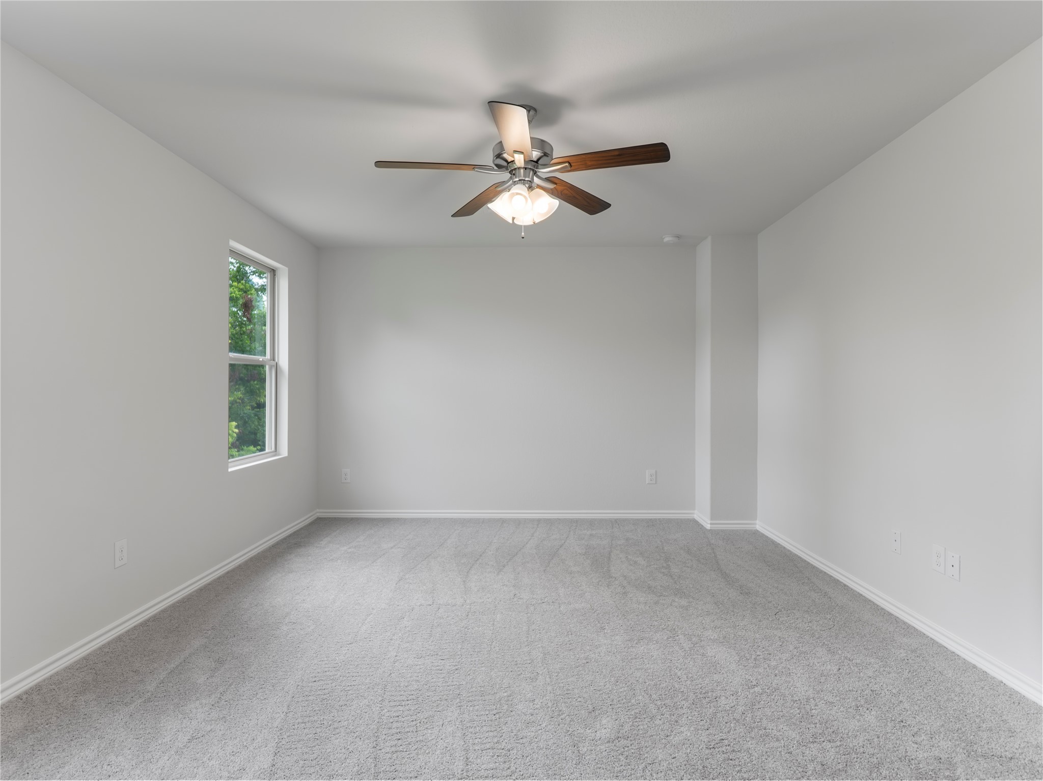 306 North Orange Street Sweeny, TX 77480 - Photo 17 of 30 wooden floor in an empty room with a window