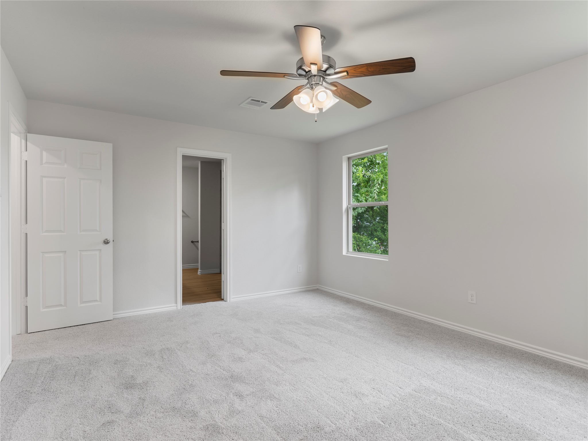 306 North Orange Street Sweeny, TX 77480 - Photo 18 of 30 a view of an empty room with a window