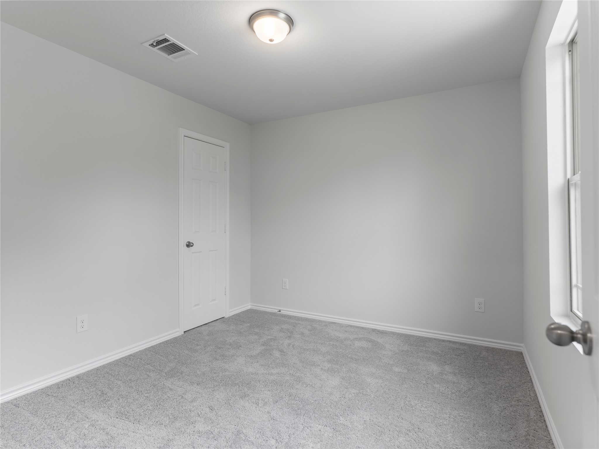 306 North Orange Street Sweeny, TX 77480 - Photo 26 of 30 an empty room with a empty space and window
