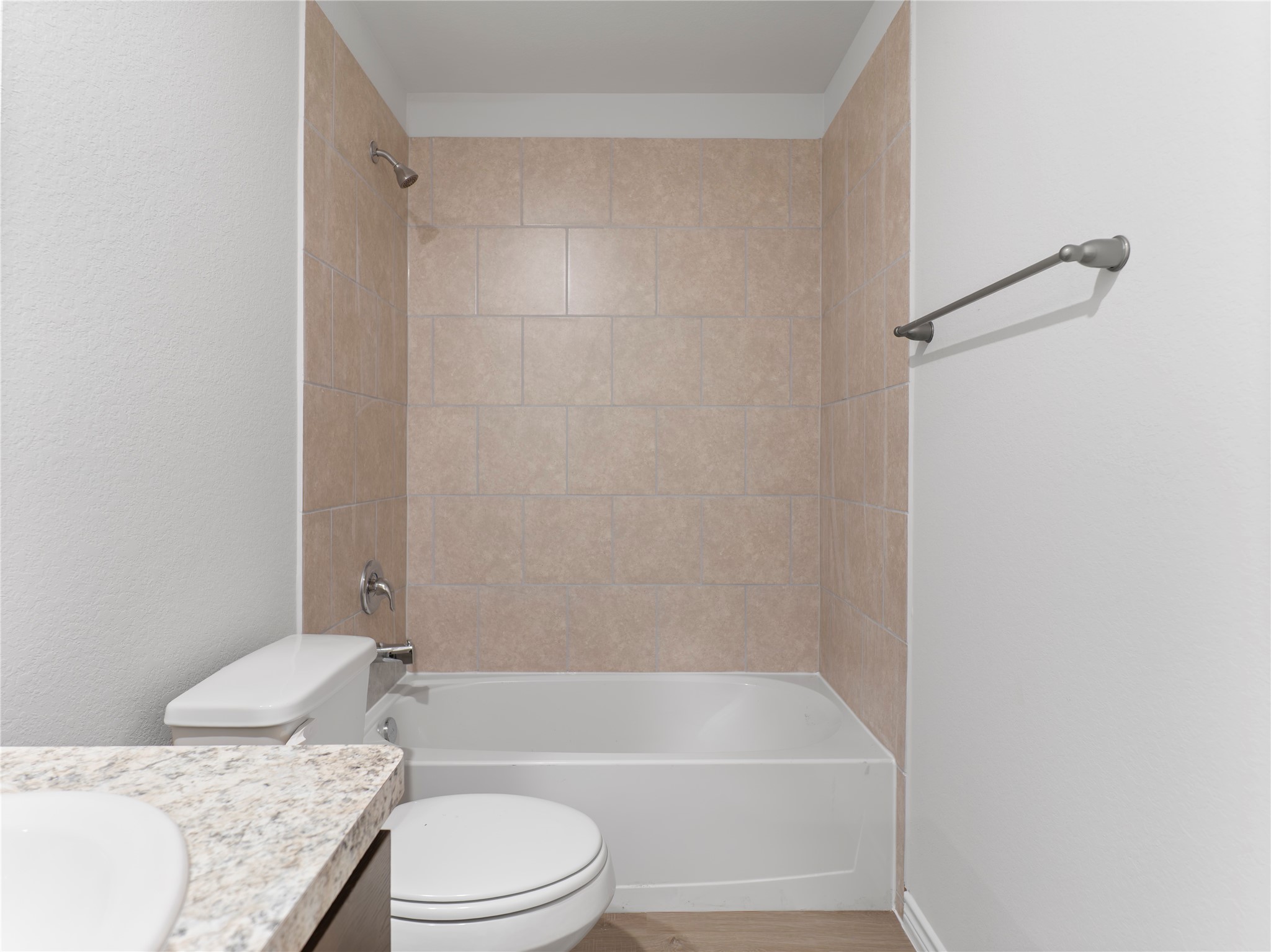 306 North Orange Street Sweeny, TX 77480 - Photo 29 of 30 a bathroom with a granite countertop bathtub shower sink vanity and toilet