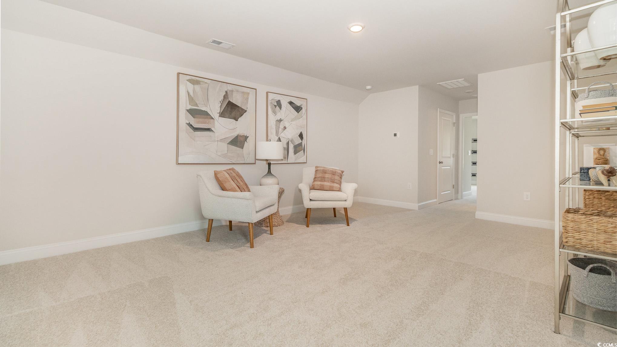 113 Keithland Drive Conway, SC 29527 - Photo 18 of 24 Sitting room with carpet floors and recessed lighting