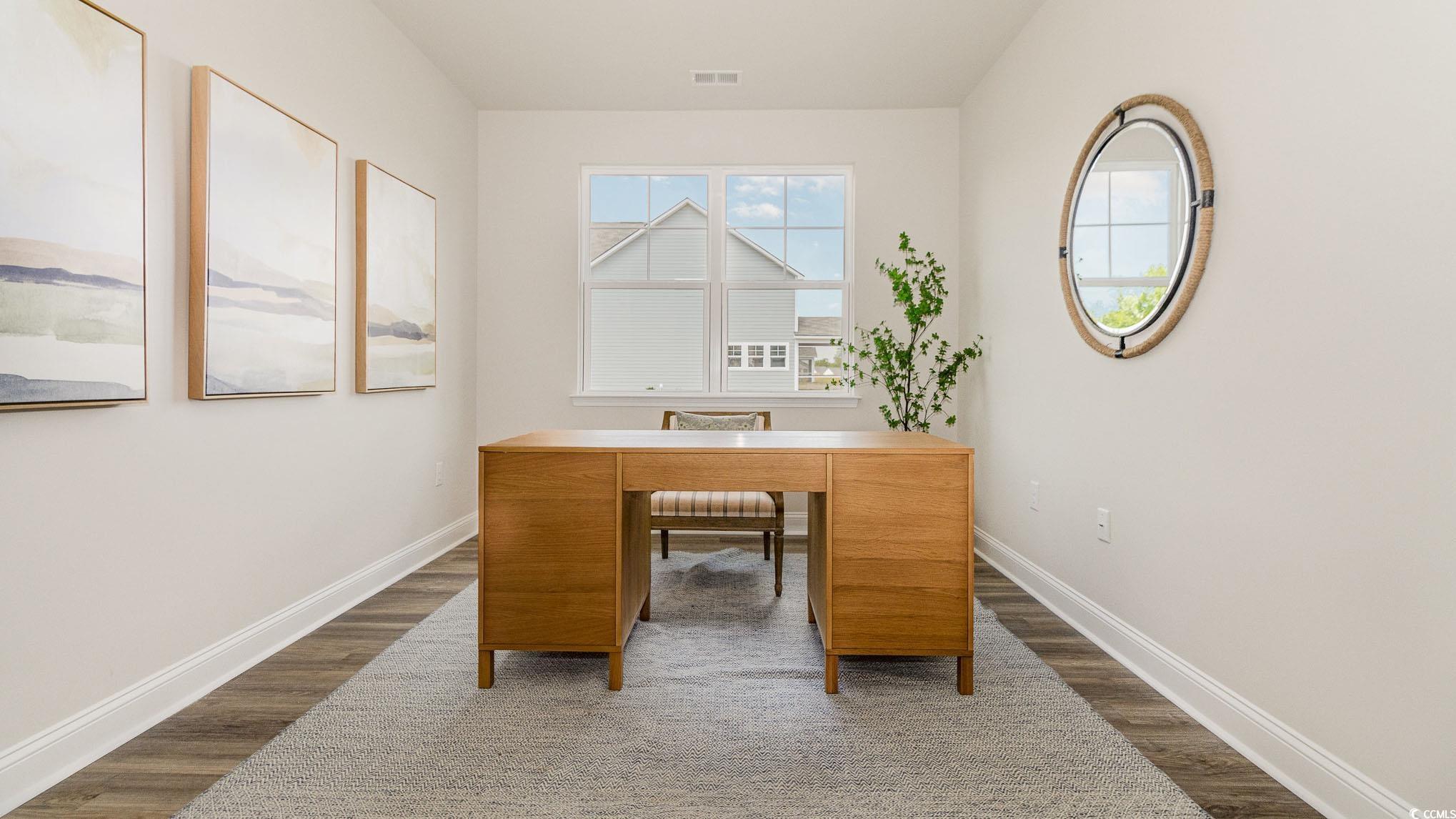 113 Keithland Drive Conway, SC 29527 - Photo 4 of 24 Home office with dark wood finished floors and baseboards