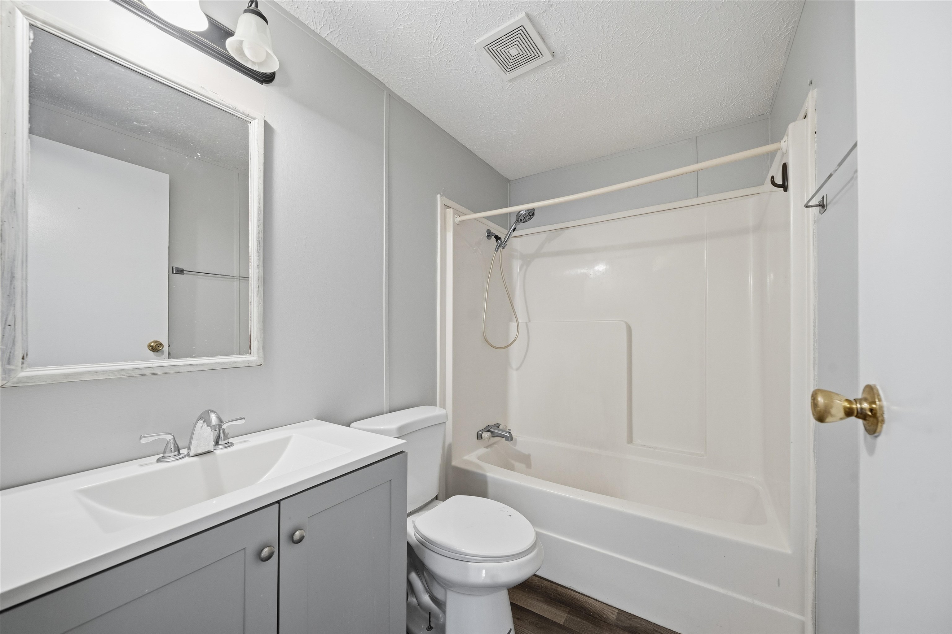 79 Stevens Road Mason, TN 38049 - Photo 16 of 21 a bathroom with a sink toilet vanity and shower