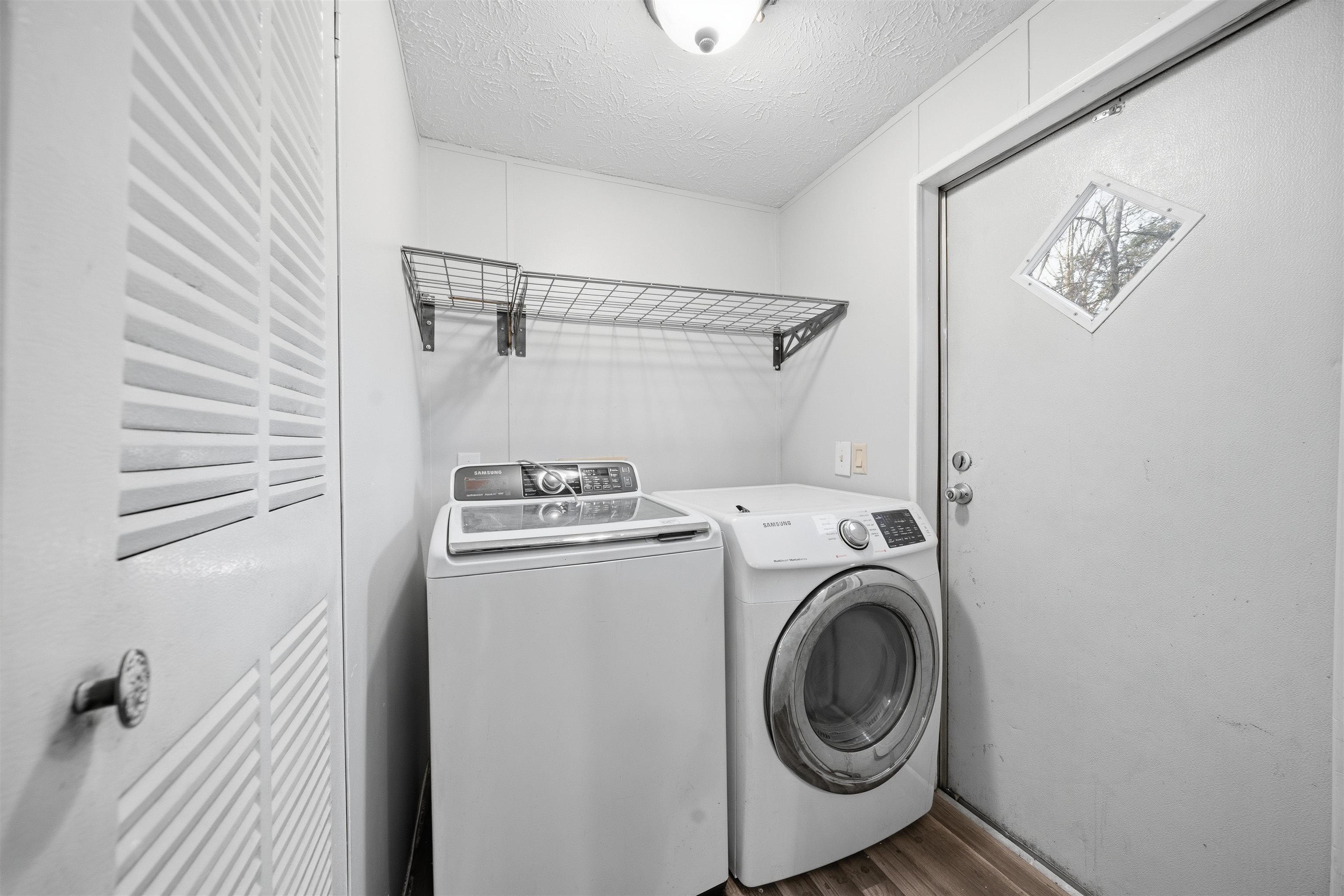 79 Stevens Road Mason, TN 38049 - Photo 17 of 21 a utility room with dryer and washer