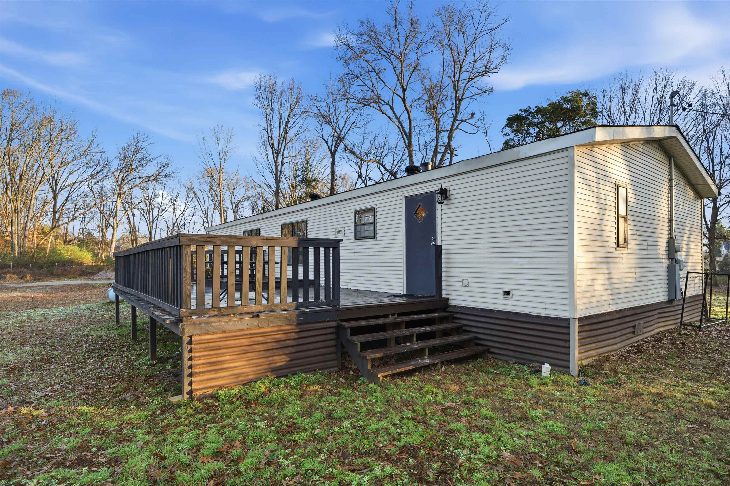 79 Stevens Road Mason, TN 38049 - Photo 18 of 21 a view of a house with a yard