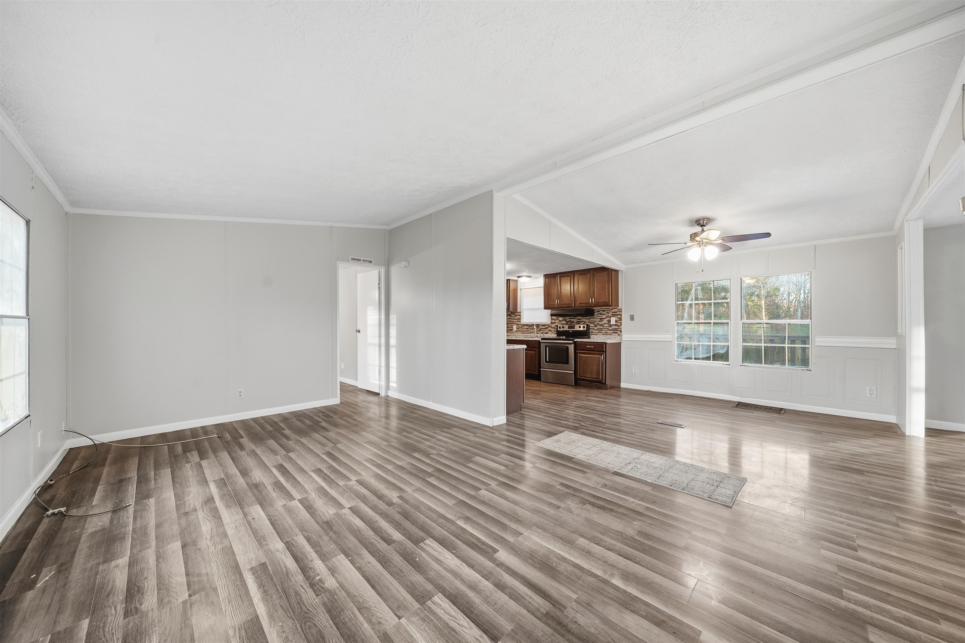 79 Stevens Road Mason, TN 38049 - Photo 4 of 21 wooden floor in an empty room with a window