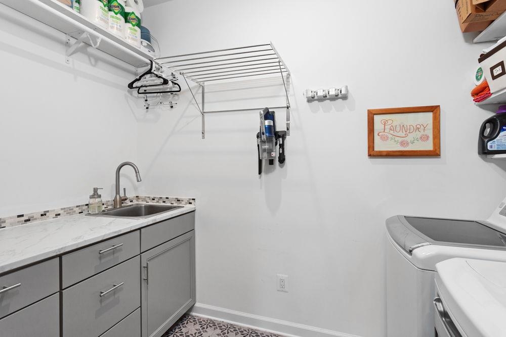 3060 Rutlege Road Harrisonburg, VA 22801 - Photo 18 of 37 a bathroom with a sink and a mirror