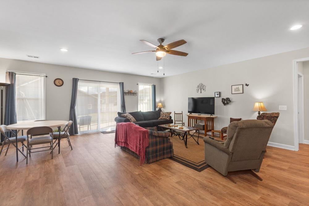 3060 Rutlege Road Harrisonburg, VA 22801 - Photo 21 of 37 a living room with furniture and a wooden floor