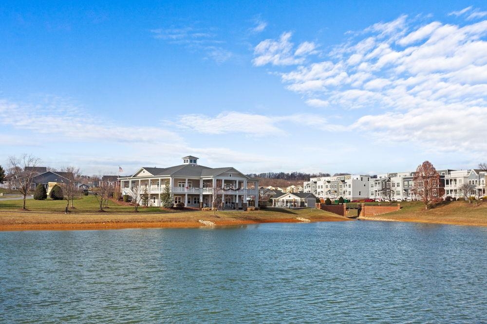 3060 Rutlege Road Harrisonburg, VA 22801 - Photo 35 of 37 a view of a swimming pool with an ocean and houses in the back