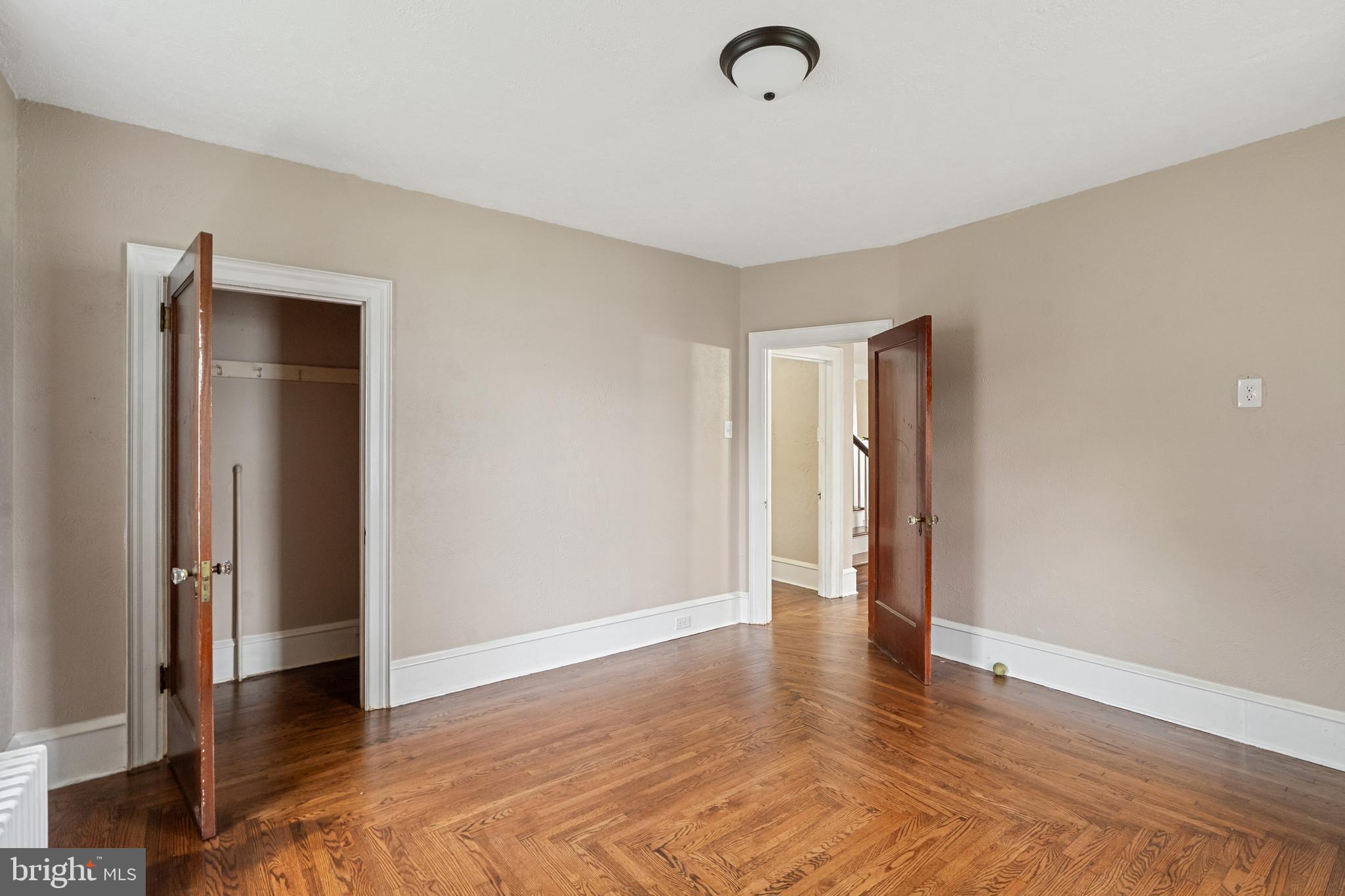 414 Main Street Dorchester, NJ 08316 - Photo 9 of 22 a view of an empty room with wooden floor and a window