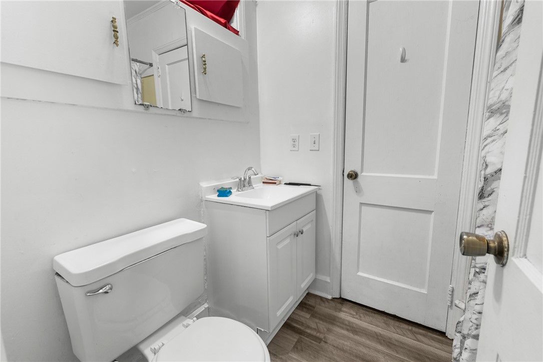 303 South Elm Street Pendleton, SC 29670 - Photo 11 of 16 This bathroom features durable flooring and a functional vanity, perfect for daily routines.