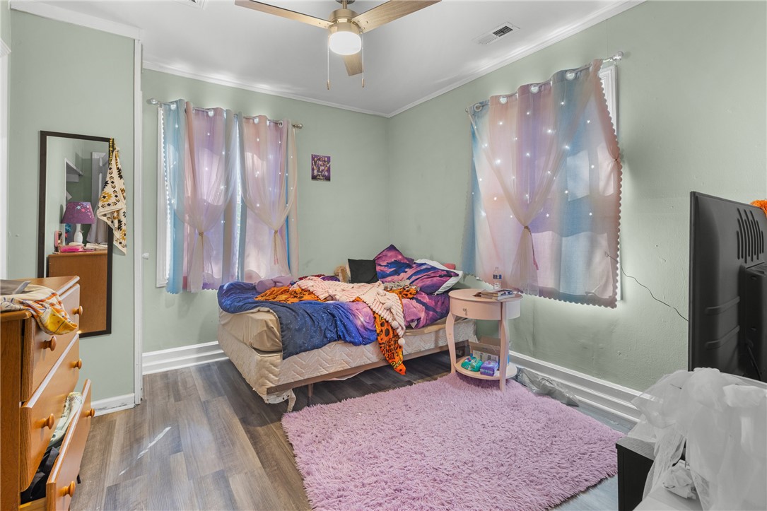 303 South Elm Street Pendleton, SC 29670 - Photo 12 of 16 This cozy bedroom offers a comfortable retreat with ample natural light.