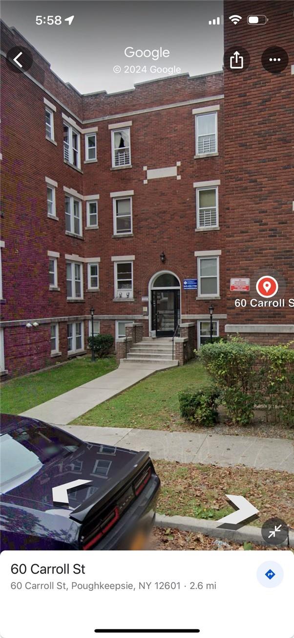 60 Carroll Street, Unit D7 Poughkeepsie, NY 12601 - Photo 1 of 1 a black and white photo of a building