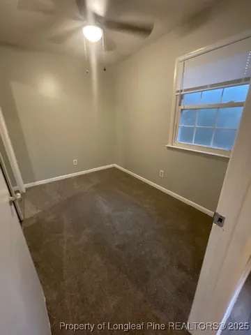 en empty room with windows