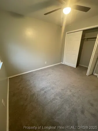 a kitchen with stainless steel appliances granite countertop a refrigerator a stove and a sink