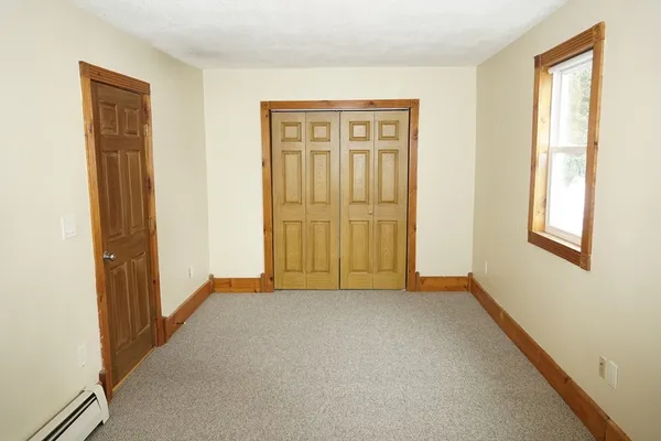 a view of an empty room with window