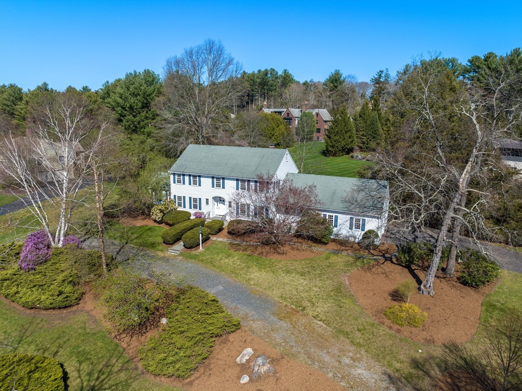 169 Fox Hill Road Needham, MA 02492 - Photo 16 of 22 a view of a house with backyard garden and sitting area