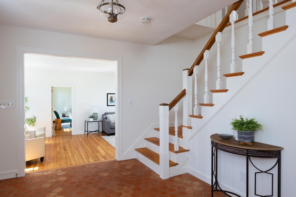 169 Fox Hill Road Needham, MA 02492 - Photo 2 of 22 a view of entryway livingroom and hall with wooden floor