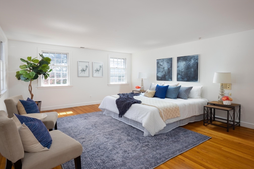 169 Fox Hill Road Needham, MA 02492 - Photo 10 of 22 a bedroom with bed couch and window