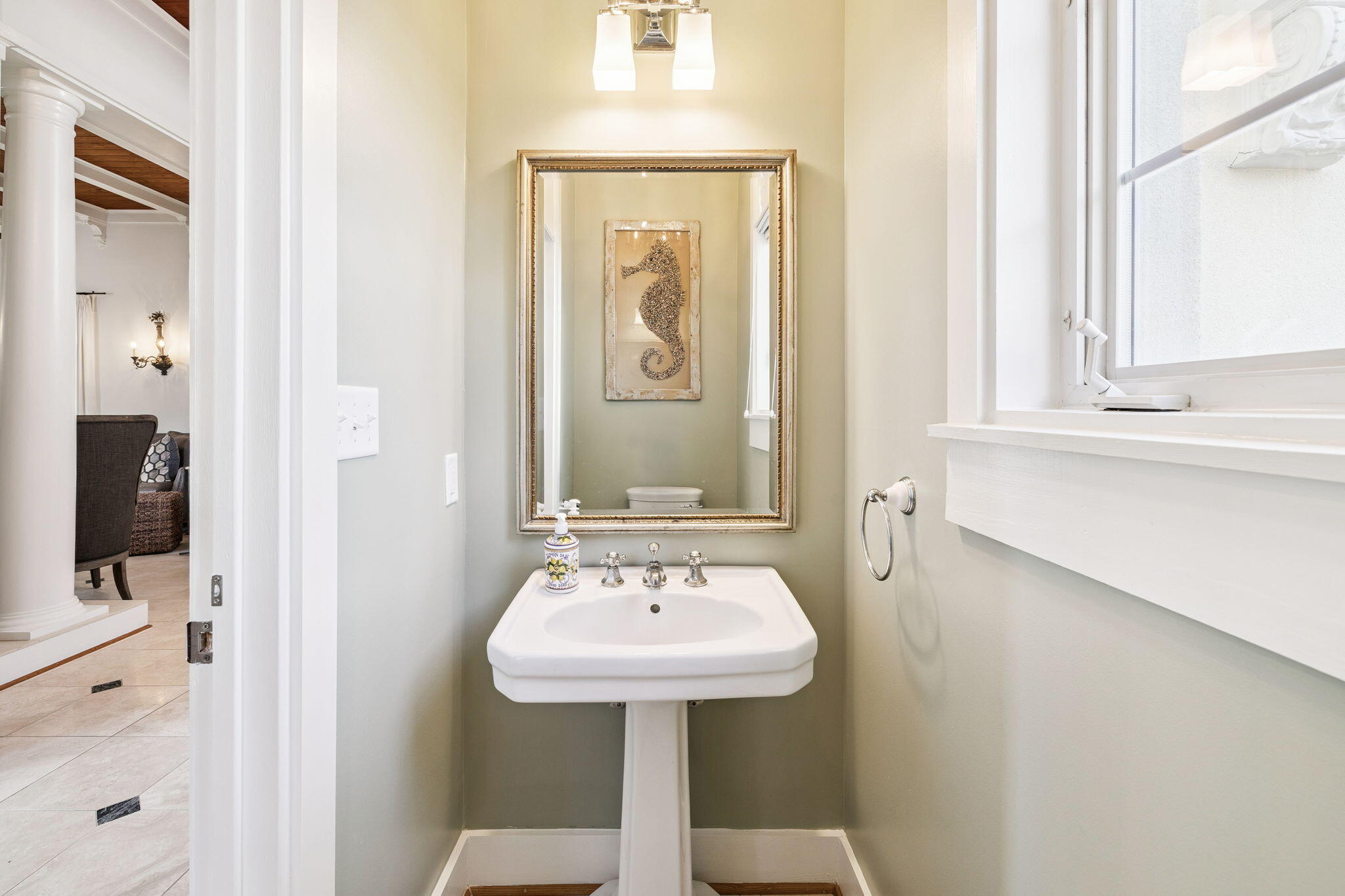 152 White Cliffs Boulevard Santa Rosa Beach, FL 32459 - Photo 34 of 82 a bathroom with a sink a mirror and a toilet