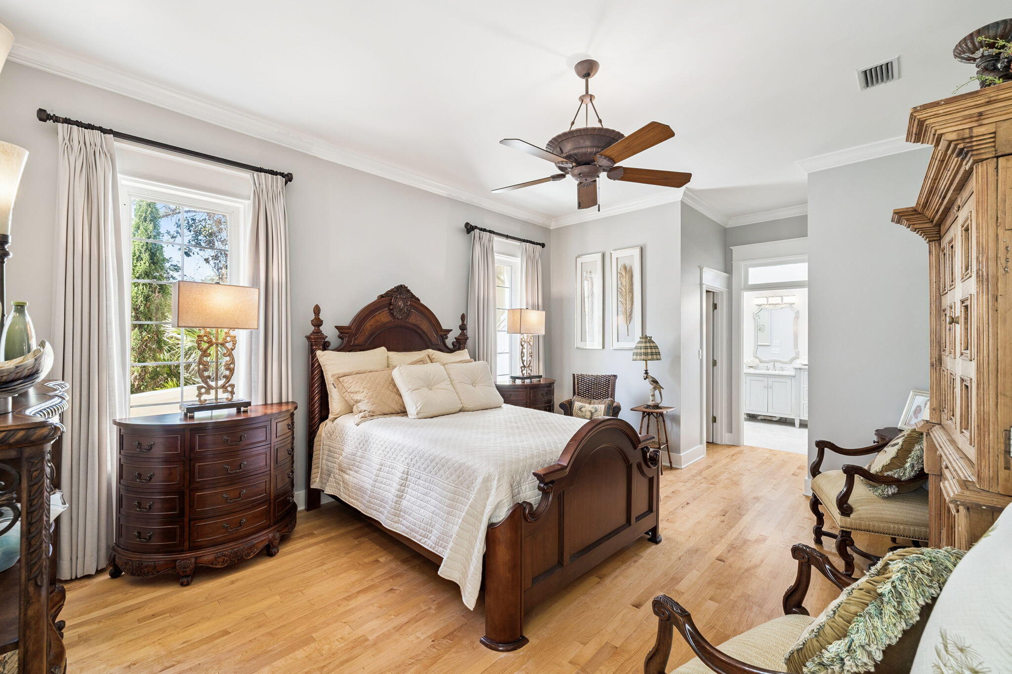 152 White Cliffs Boulevard Santa Rosa Beach, FL 32459 - Photo 40 of 82 a bedroom with a bed and wooden floor