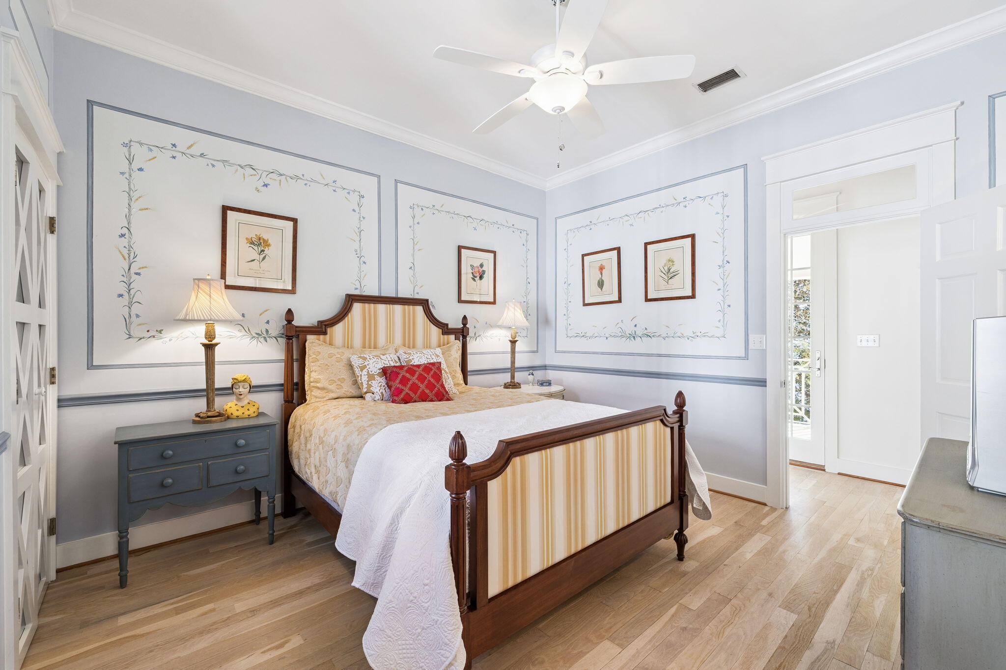 152 White Cliffs Boulevard Santa Rosa Beach, FL 32459 - Photo 51 of 82 a bedroom with a large bed and a chandelier