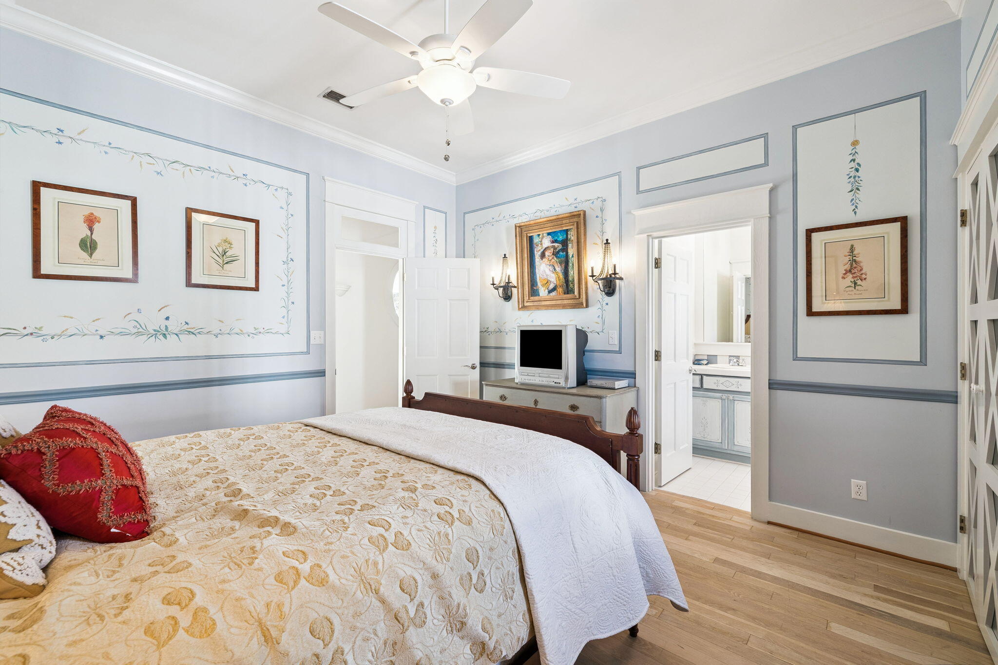 152 White Cliffs Boulevard Santa Rosa Beach, FL 32459 - Photo 52 of 82 a bedroom with a large bed and a chandelier