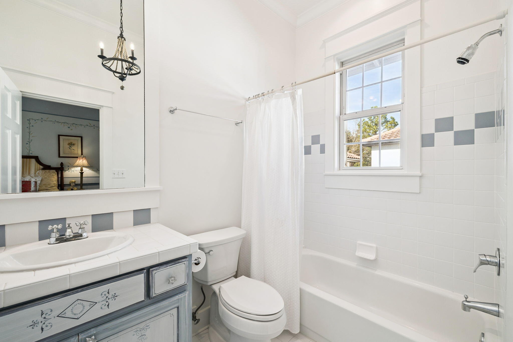 152 White Cliffs Boulevard Santa Rosa Beach, FL 32459 - Photo 53 of 82 a bathroom with a sink a toilet a mirror a vanity and shower