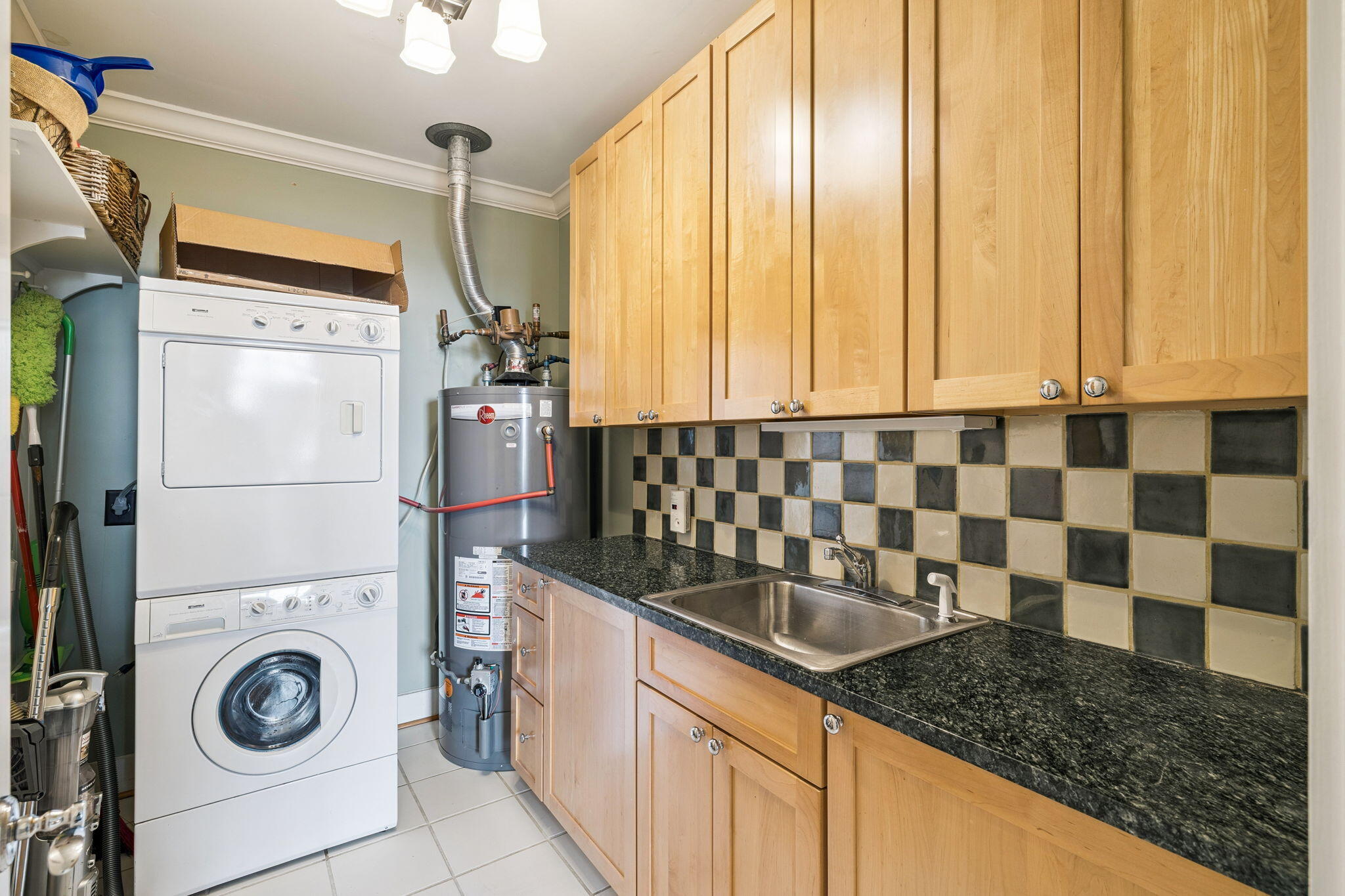 152 White Cliffs Boulevard Santa Rosa Beach, FL 32459 - Photo 60 of 82 a bathroom with a sink a washer and dryer