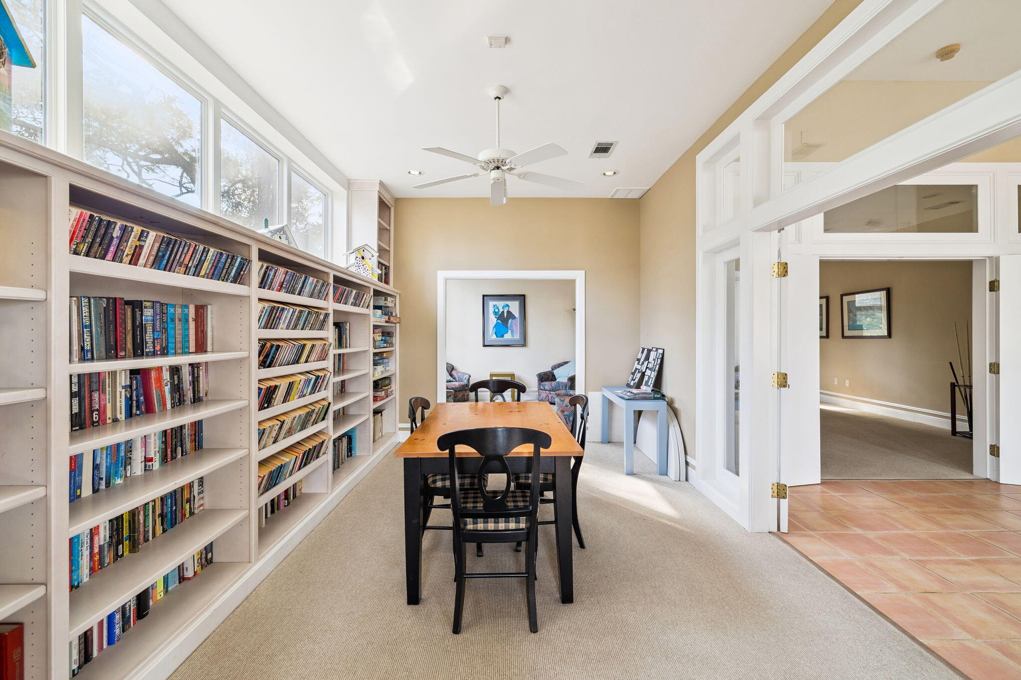 152 White Cliffs Boulevard Santa Rosa Beach, FL 32459 - Photo 72 of 82 a dining room with furniture and a book shelf