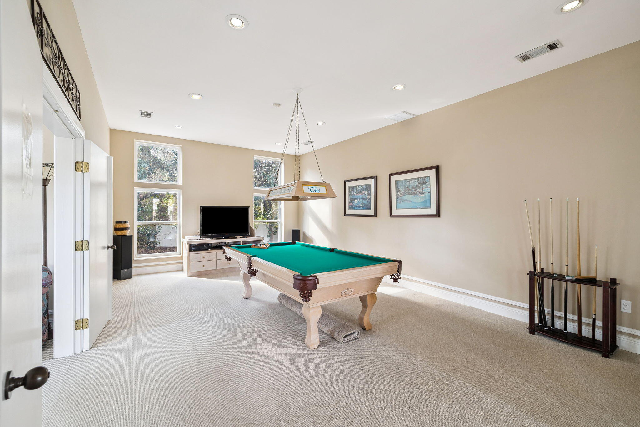 152 White Cliffs Boulevard Santa Rosa Beach, FL 32459 - Photo 74 of 82 a living room with furniture a flat screen tv and a table
