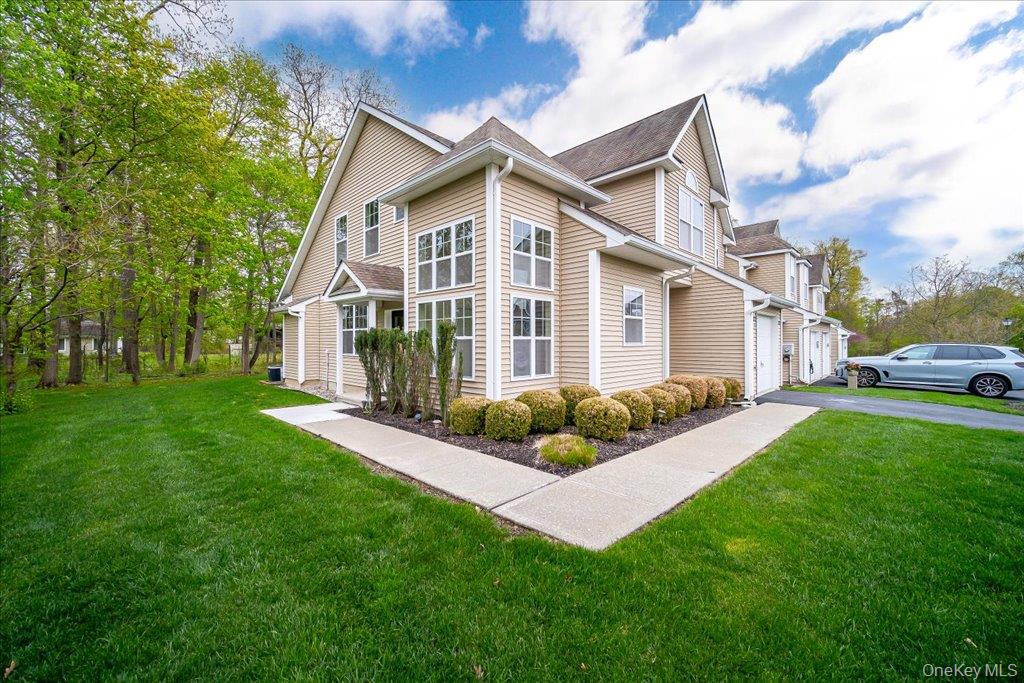 26 Halley Court Poughkeepsie, NY 12601 - Photo 2 of 47 a view of a yard in front of house
