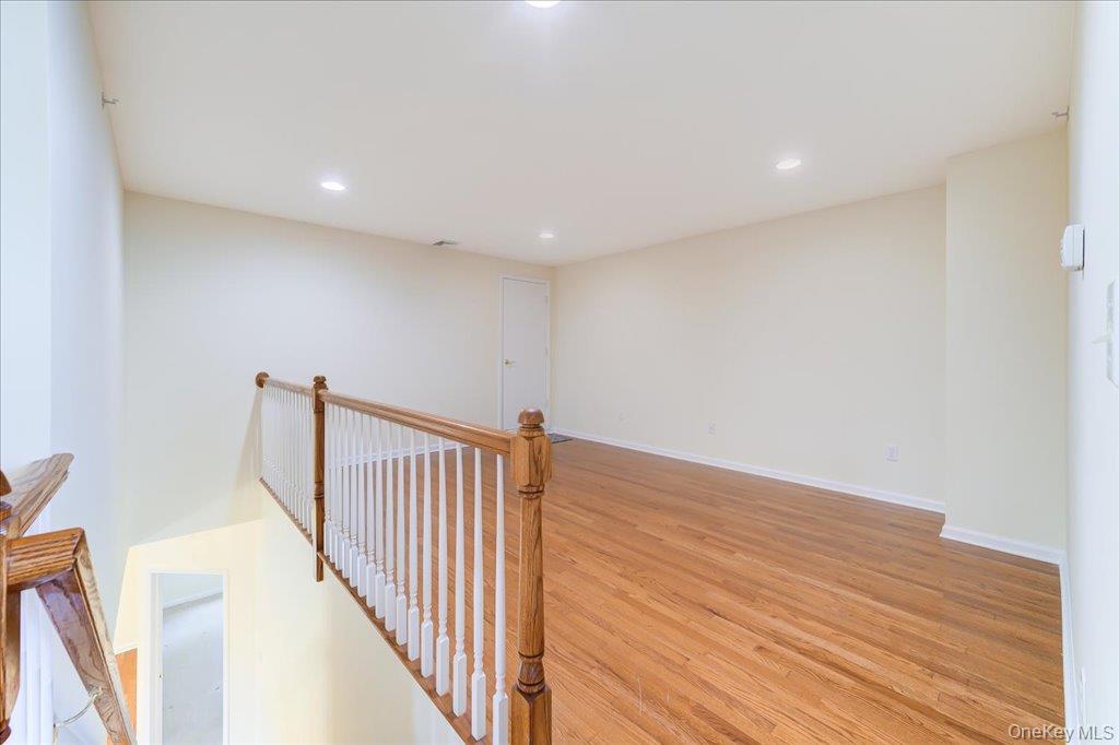 26 Halley Court Poughkeepsie, NY 12601 - Photo 22 of 47 a view of a hallway with wooden floor