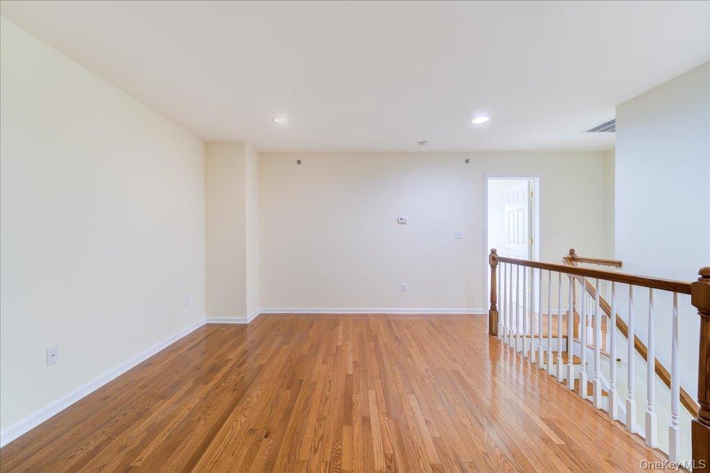26 Halley Court Poughkeepsie, NY 12601 - Photo 23 of 47 a view of hallway with wooden floor