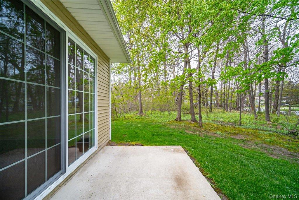26 Halley Court Poughkeepsie, NY 12601 - Photo 36 of 47 a view of a backyard with green space