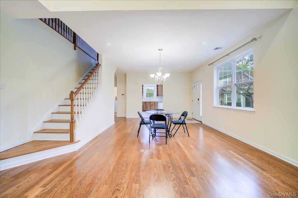 26 Halley Court Poughkeepsie, NY 12601 - Photo 4 of 47 a view of a dining room with furniture window and wooden floor