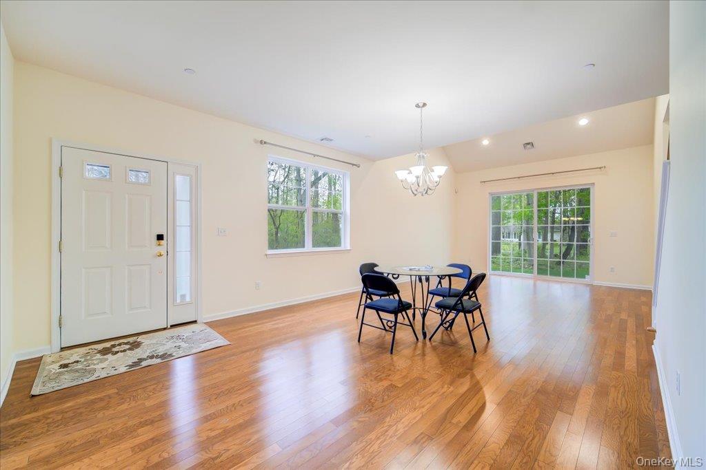 26 Halley Court Poughkeepsie, NY 12601 - Photo 5 of 47 a dining room with furniture window wooden floor