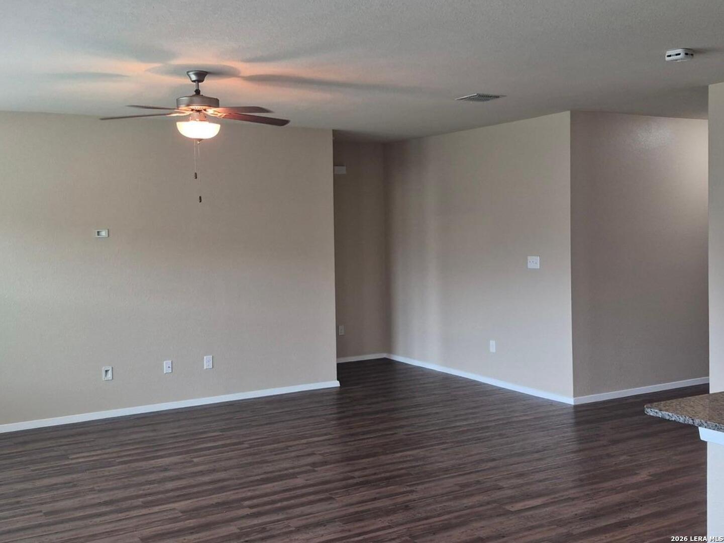 7102 Zuma Beach Converse, TX 78109 - Photo 4 of 31 a view of an empty room with wooden floor