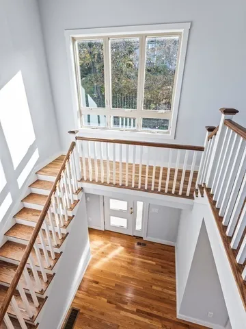 a view of staircase with large window