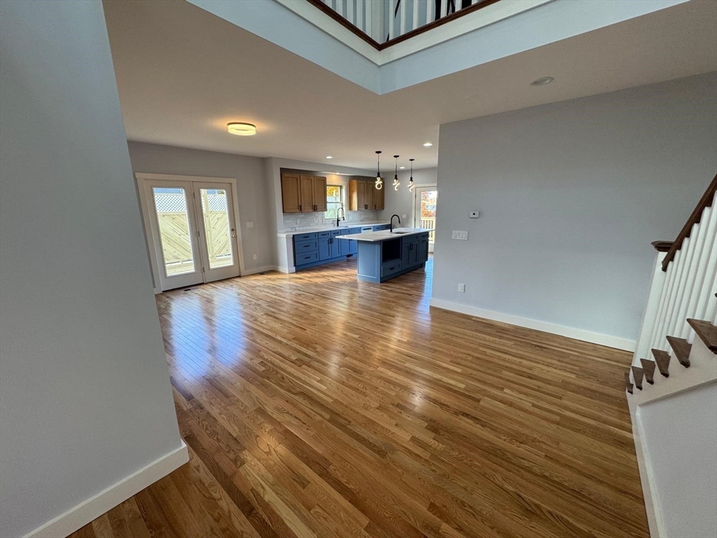 41 Westminster Street Worcester, MA 01605 - Photo 5 of 36 a view of kitchen and hall with wooden floor
