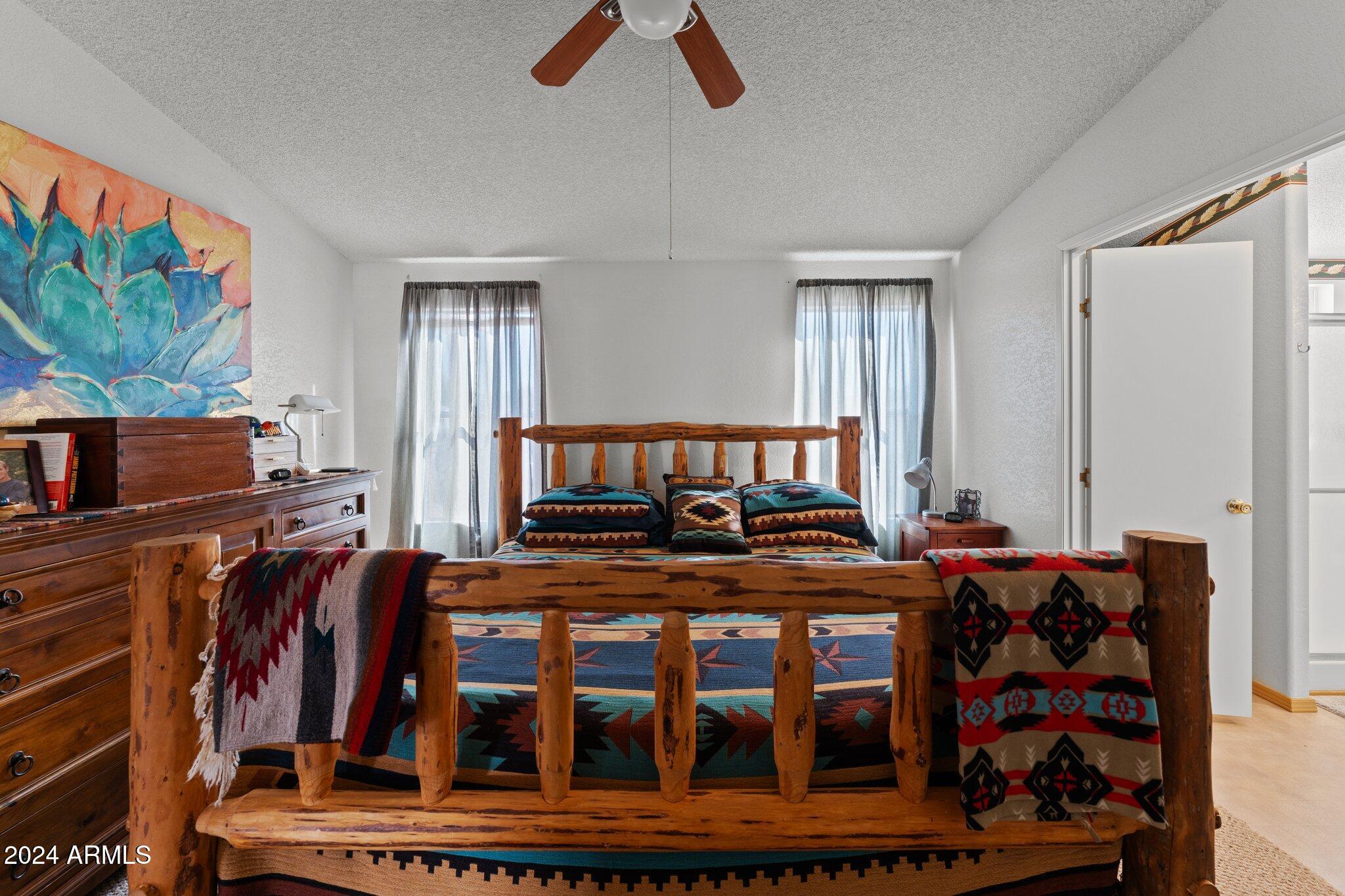 30854 Wandering Way Congress, AZ 85332 - Photo 11 of 43 a bedroom with furniture and window