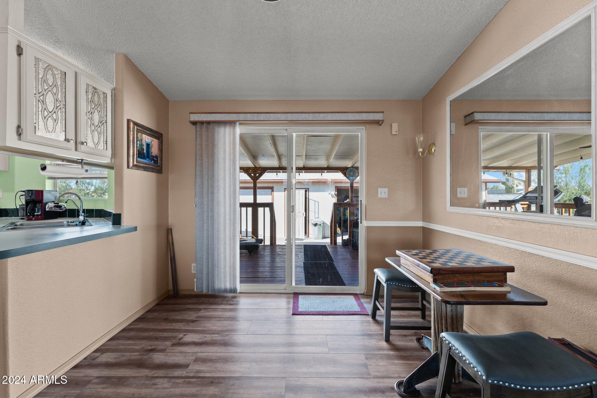 30854 Wandering Way Congress, AZ 85332 - Photo 14 of 43 a view of a livingroom with furniture and a window