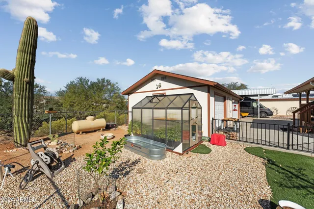 a view of a garden with a slide